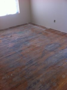 Old hardwood floor that needs refinishing